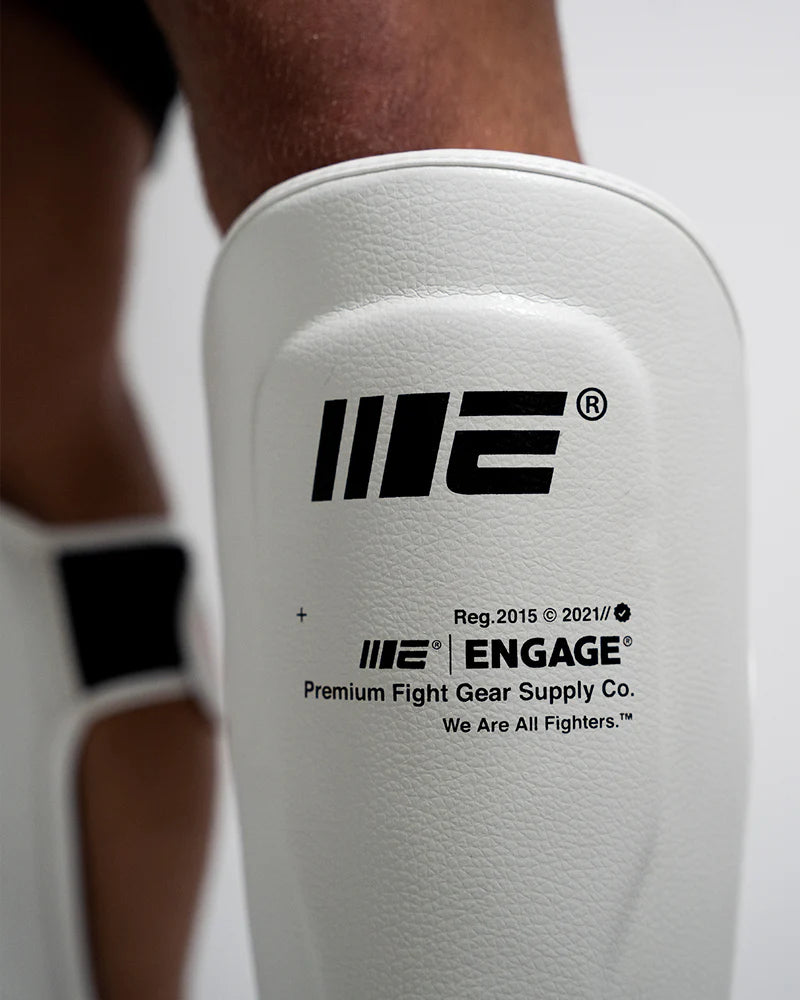 Espinilleras Engage W.I.P Series Blanco